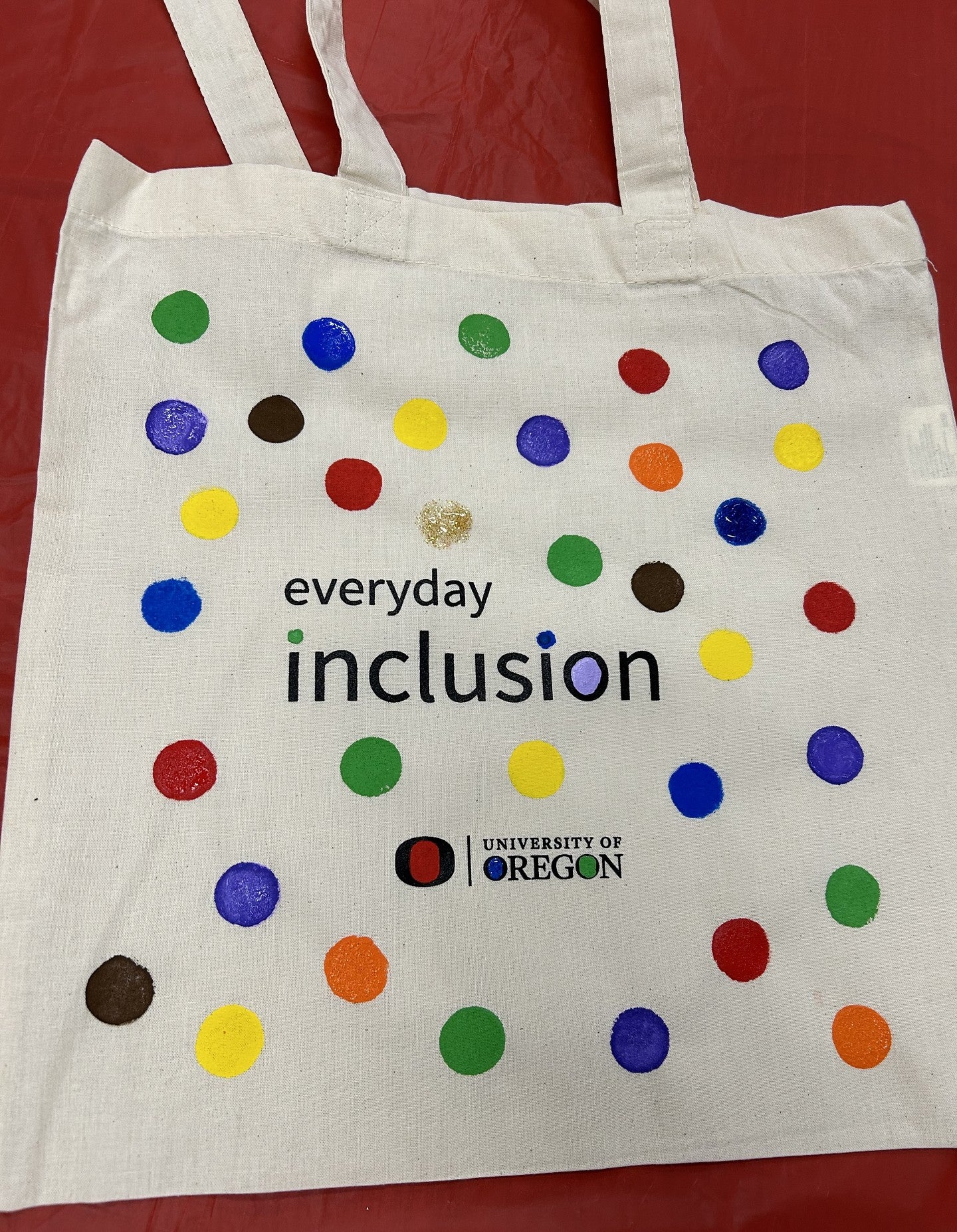 Everyday Inclusion bag with many different colored dots