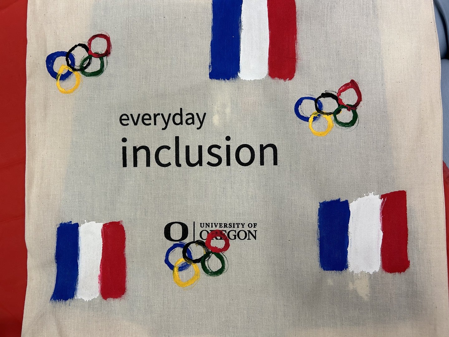 Everyday Inclusion tote bag with French flags and Olympic rings