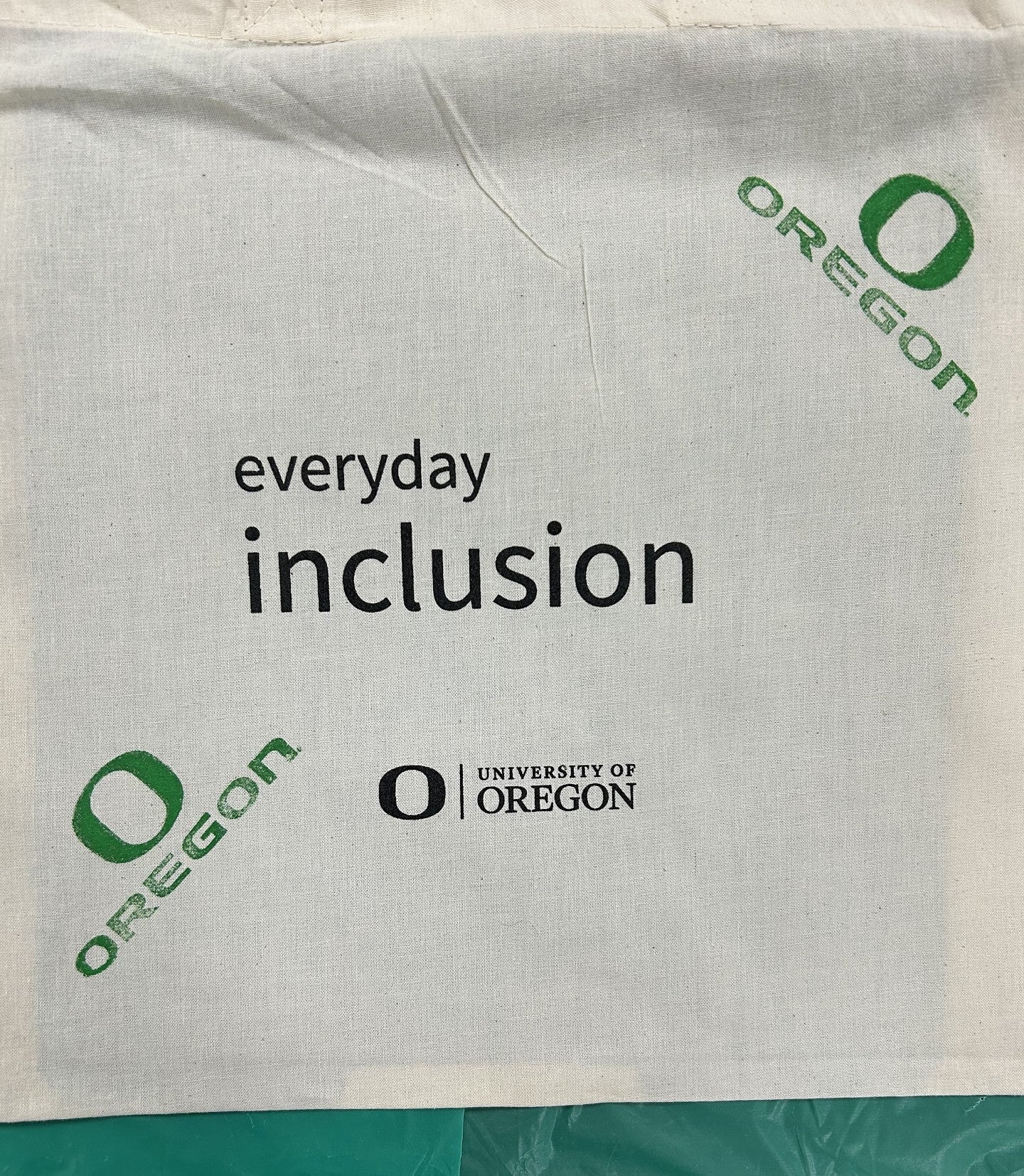 Everyday Inclusion bag with green Oregon stamps