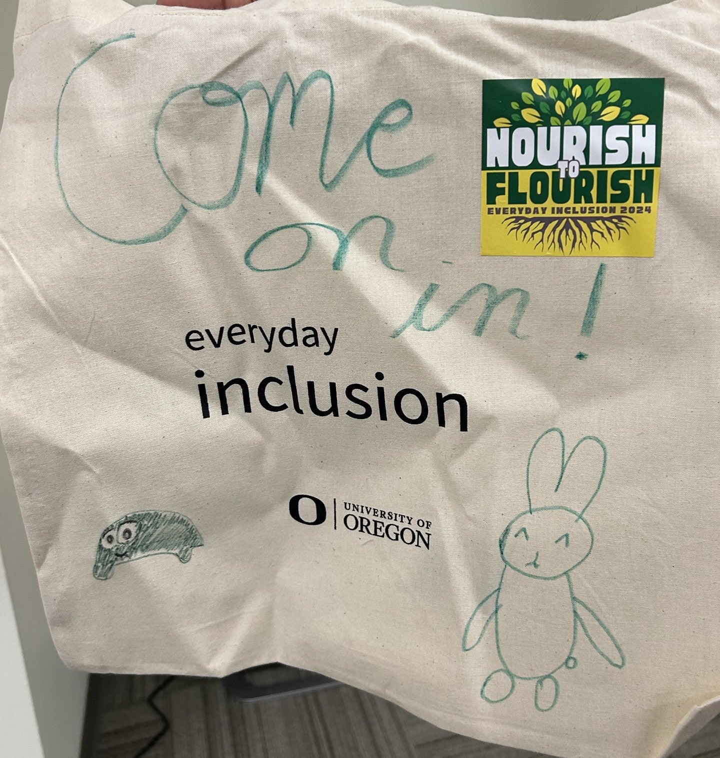 Everyday inclusion bag with the words COME ON IN and a rabbit