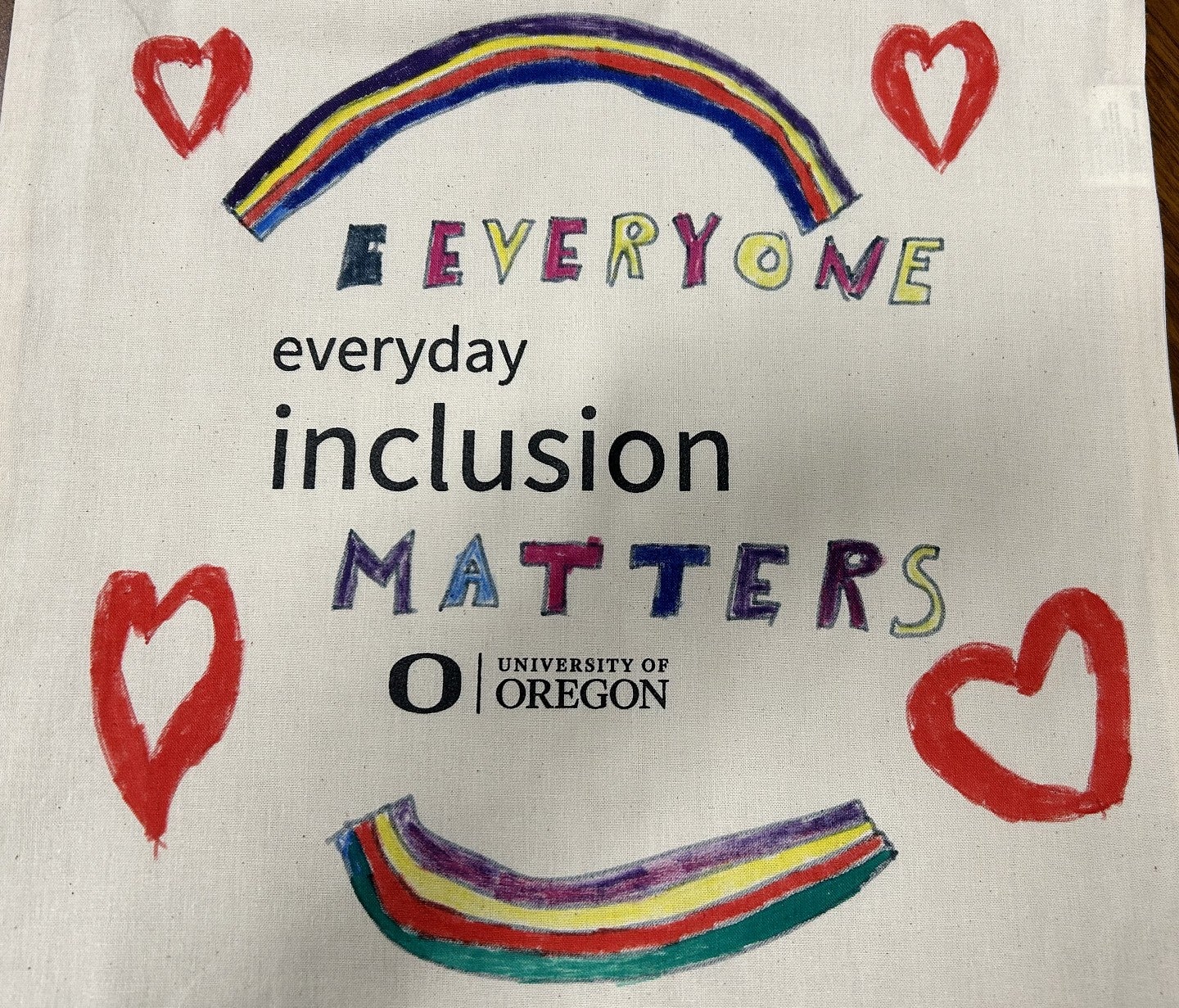 Everyday Inclusion bag with EVERYONE MATTERS rainbows and hearts