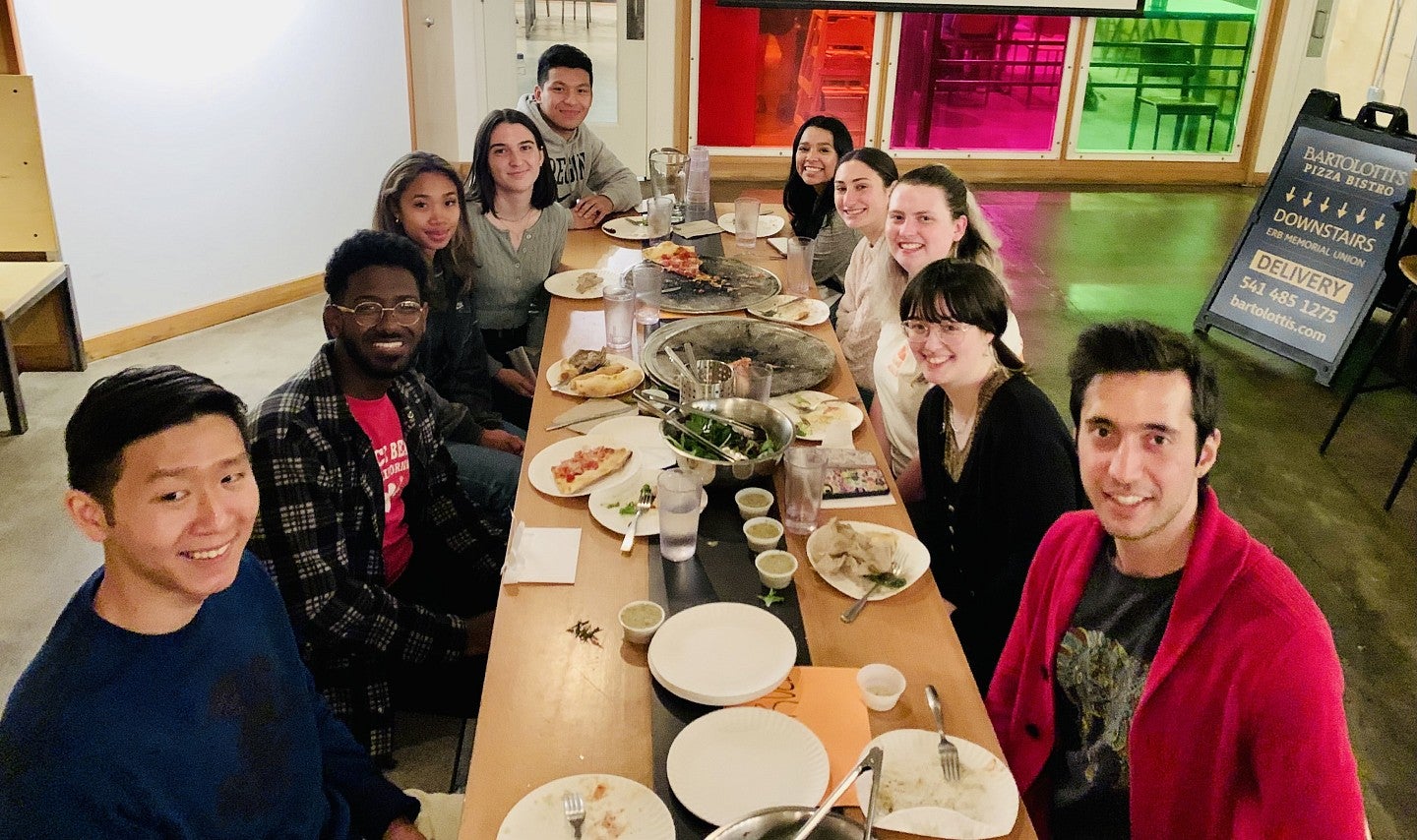 2021-22 cohort eating pizza at Bartolotti's