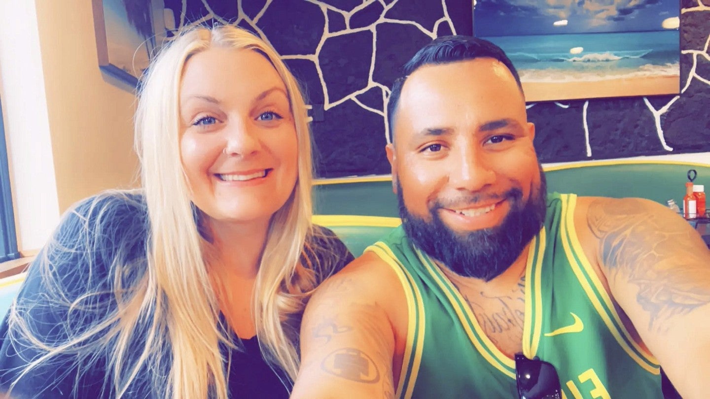 Eric and his wife out at a restaurant