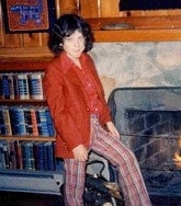 12-year-old Dan in red jacket and shirt and red striped pants (groovy threads) ready for his first singing solo in the 7th grade 